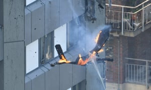 Burningdebris from Grenfell Tower thought to be the cladding used on the outside.