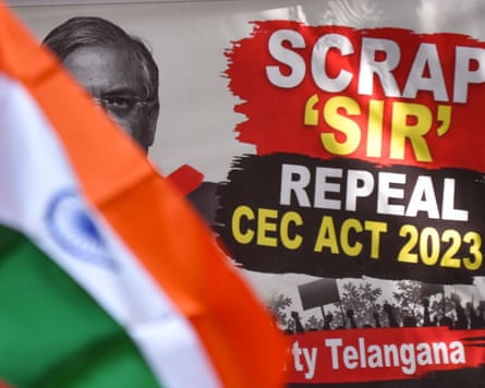 A protester waves an Indian national flag beside a banner depicting India's chief election commissioner, Gyanesh Kumar during a sit-in protest in Hyderabad on Saturday.