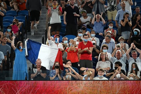 Gael Monfils fans with a French flag.