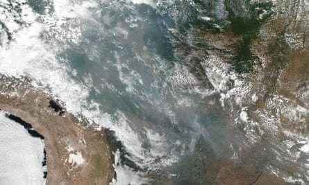 Nasa image from 20 August showing smoke and fires in several Brazilian states including Amazonas, Mato Grosso and Rondonia.