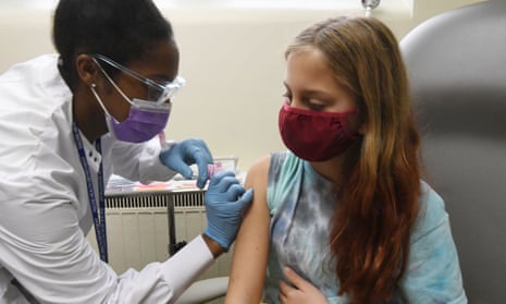 A 10-year-old in Wisconsin in the US receiving the Pfizer vaccine yesterday.