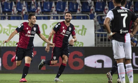 Luca Gagliano (left) celebrates his early goal for Cagliari.