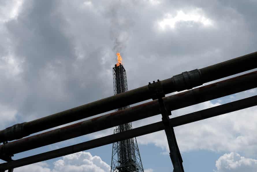 A view shows a tower flaring gas at an LNG processing plant operated by Shell and others in Bonny Island, in Rivers state, Nigeria.