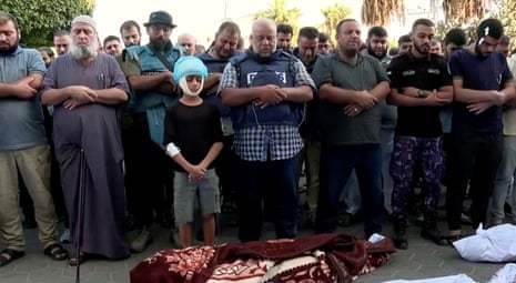 Wael Al-Dahdouh attends the funeral of his wife and children in central Gaza Strip