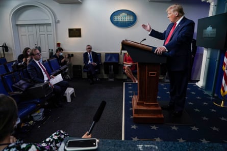 Trump at the press briefing on Thursday.