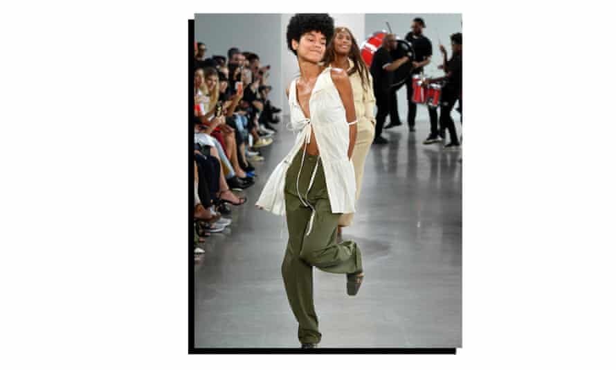 A model dances down the catwalk at the Deveaux show at New York fashion week, September 2019.