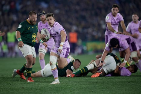 Scotland's fullback Kyle Rowe runs to score a try.
