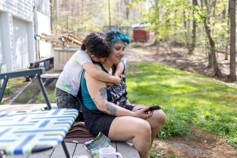 A son hugs his mother