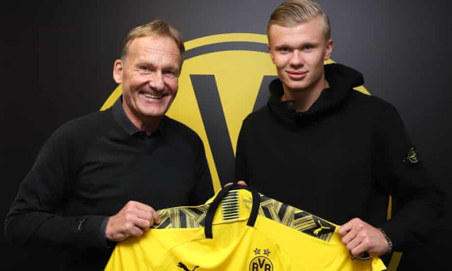 Erling Braut Haaland, right, Borussia Dortmund CEO Hans-Joachim Watzke after agreeing his move to the Bundesliga.