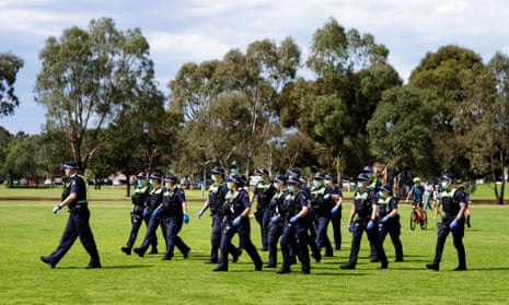 Large numbers of police are seen at the Elsternwick Park in Melbourne over the weekend as protesters rally against the lockdowns restrictions. 