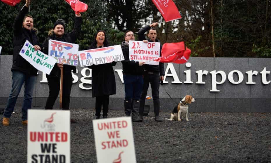 Striking British Airways cabin crew demonstrate outside Glasgow airport in January
