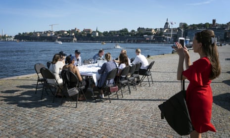A socially distanced after-work drink in Stockholm. Sweden is considering local lockdowns.