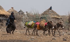 A woman driving donkeys to transport water in drought-affected areas in Ethiopia’s Somali region.