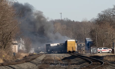 Smoke rises from a derailed cargo train in East Palestine, Ohio.