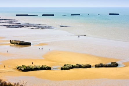 The remains of a Mulberry harbour on the beach in Arromanches.