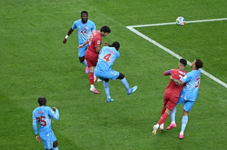 Portugal’s Joao Neves scores their first goal with a header.
