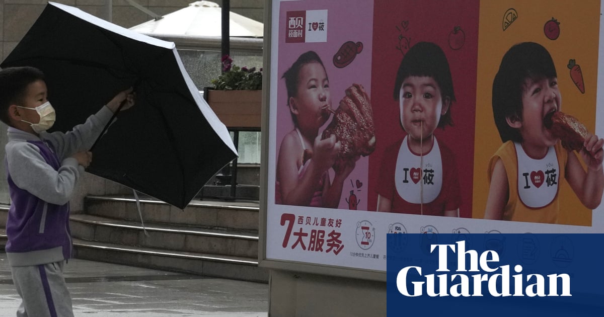 ‘Too much of a burden’: Chinese couples react to three-child policy