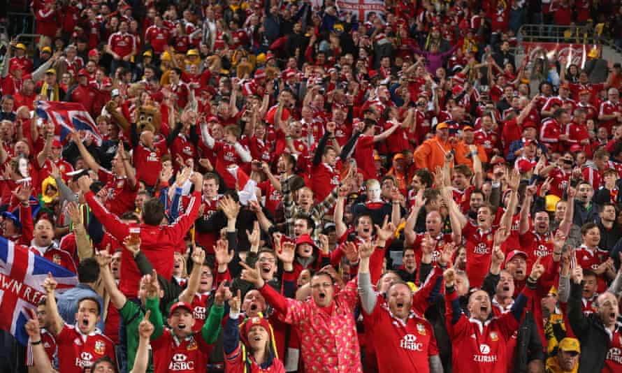 Lions supporters celebrate the Lions' victory in the 2013 third Test against Australia at ANZ Stadium in Sydney
