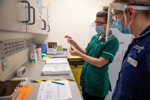 A nurse designs the vaccine and reconstitutes it with saline.