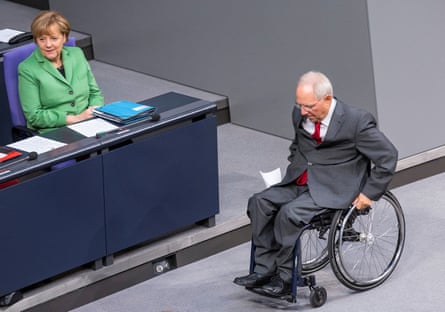 Angela Merkel and Finance Minister Schaeuble attend a debate at the lower house of parliament Bundestag in BerlinFILE PHOTO: German Chancellor Angela Merkel and Finance Minister Wolfgang Schaeuble attend a debate at the lower house of parliament Bundestag in Berlin, November 25, 2014. REUTERS/Hannibal Hanschke//File Photo