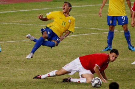 Neymar takes to the sky in 2009 after a challenge by Switzerland’s Frédéric Veseli.