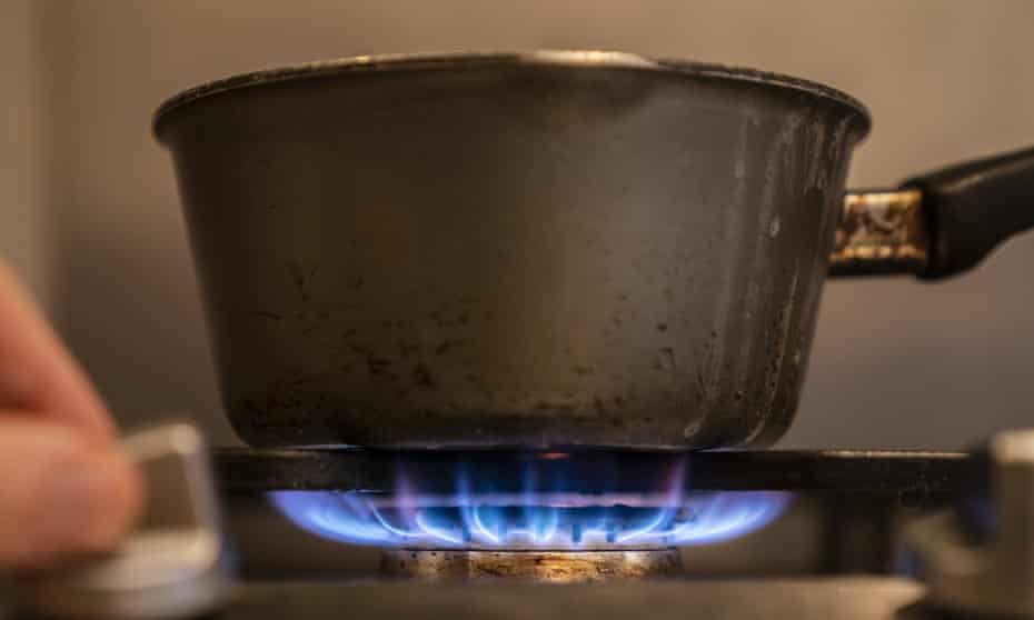 A saucepan on a gas hob.