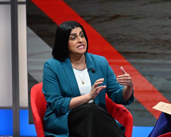 Asylum system in UK ‘out of control’ and dividing country, home secretary says