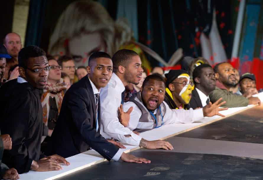 Cast and audience at Birmingham Opera’s 2015 production of The Ice Break by Michael Tippett, performed in a warehouse.