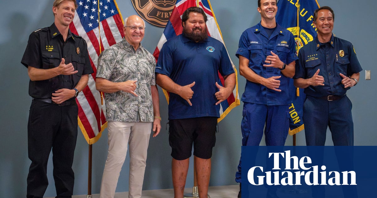 Hawaii teenager rescued after spending night clinging to kayak in ocean