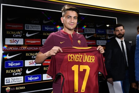 AS Roma’s new player Cengiz Under poses with his new jersey