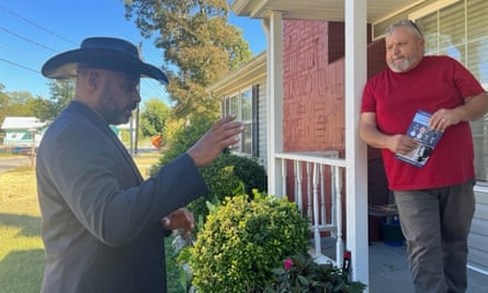 Democratic candidate Marcus Flowers (left) making his pitch to voter Chip Freeman (right) in Rome, Georgia.