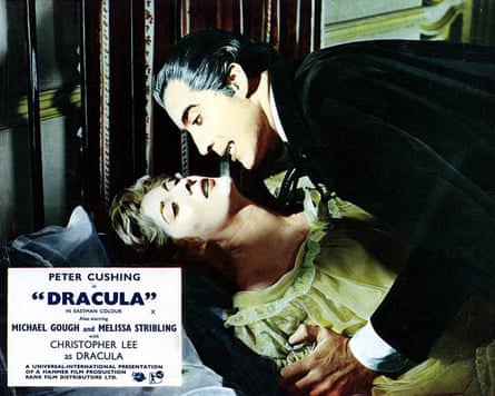 Dracula leans over one of his victims preparing to bite her heck in a poster promoting the 1958 film