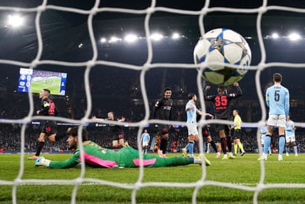 Bayer Leverkusen’s Alex Grimaldo (left) celebrates scoring their side’s first goal in their 2-0 Champions League, league phase victory over Manchester City at the Etihad Stadium.