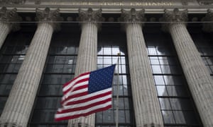 An American flag flies outside the New York Stock Exchange.