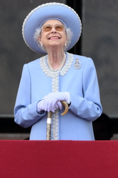 Queen Elizabeth watches a flypast from Buckingham Palace balcony following the Queen’s birthday parade, the trooping the colour, as part of platinum jubilee celebrations.