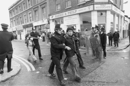 Protesters against a National Front rally in Southall town hall are detained in April 1979.