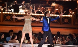 The show’s hosts, Julianne Hough and Darren Criss, perform a number.