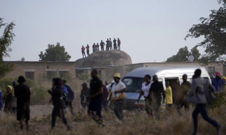 Zimbabwe opposition supporters gather at the funeral of Moreblessing Ali in Nyatsime a neighborhood on the outskirts of Harare, Tuesday, June, 14, 2022.