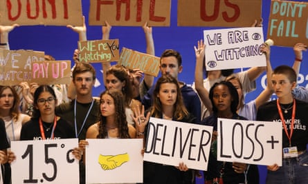 Young activists hold a demonstration at Cop27 climate conference in Sharm el-Sheikh, Egypt, 19 November.