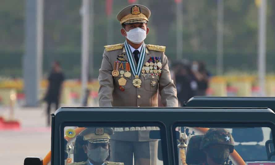 Commander-in-Chief of Defence Services Senior General Min Aung Hlaing attends a military parade to mark the 77th Armed Forces
 Day.