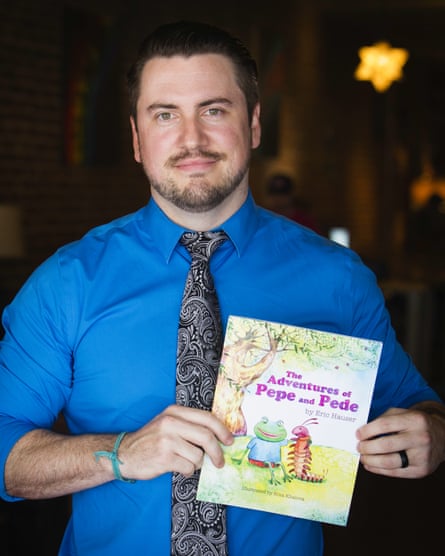 Eric Hauser with his book The Adventures of Pepe and Pede.