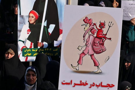 Iranian women attend a pro-hijab rally in Tehran this summer