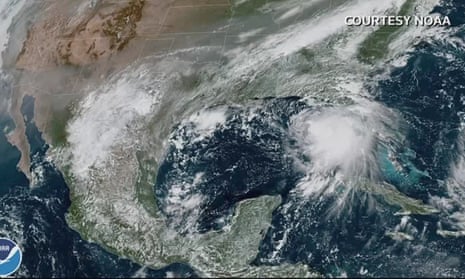 A satellite image of Hurricane Sally as a tropical storm in the Gulf of Mexico.