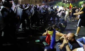 Romanian demonstrators face riot police during an expatriates protest against government corruption in Bucharest. 4160.jpg?w=300&q=55&auto=format&usm=12&f