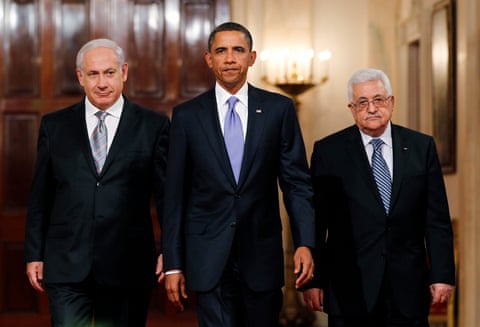 President Barack Obama, center, arrives with the Israeli prime minister, Benjamin Netanyahu, left, and Palestinian president, Mahmoud Abbas, right, to make a statement on Middle East peace talks in the east room of the White House on 1 September 2010. Photograph: Jason Reed/Reuters