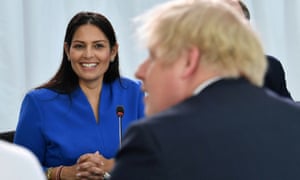 Priti Patel looks on as Boris Johnson chairs a cabinet meeting at the University of Sunderland