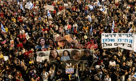 Protesters clash with police officers during a demonstration in Tel Aviv on Saturday.
