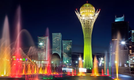 Song Fountain and Bayterek Tower illuminations along Astana’s central boulevard.