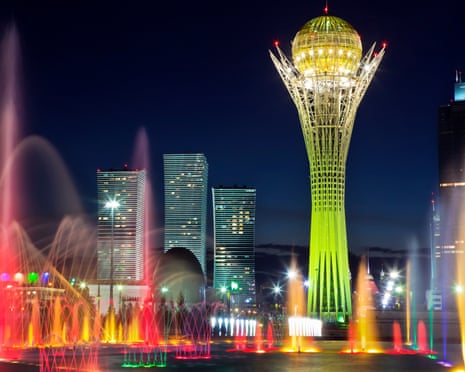 Song Fountain and Bayterek Tower illuminations along Astana’s central boulevard.