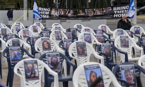 Two hundred chairs with portraits of hostages kidnapped by Hamas militants during the 07 October attacks are displayed in front of the United Nations European headquarters in Geneva, Switzerland on Thursday.